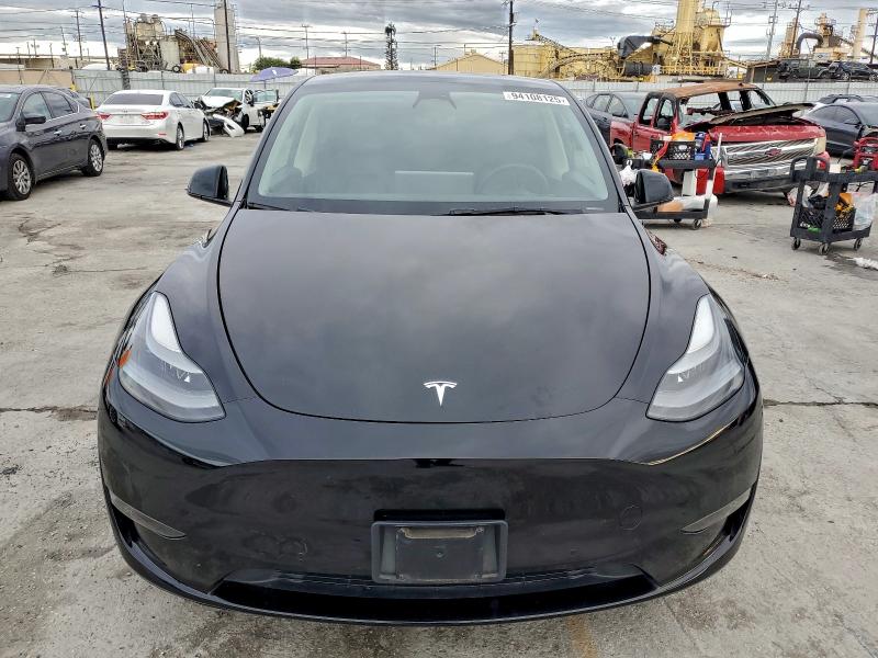 Photo 5 from auction – 2022 TESLA MODEL Y with VIN 7SAYGDEF0NF572149