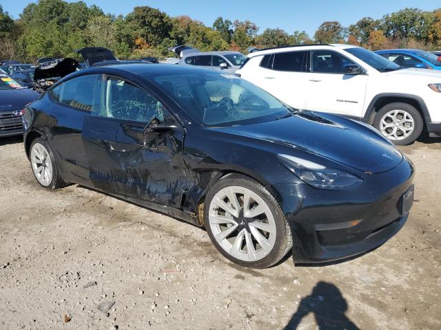 Photo 4 from auction – 2022 TESLA MODEL 3 with VIN 5YJ3E1EA9NF369339