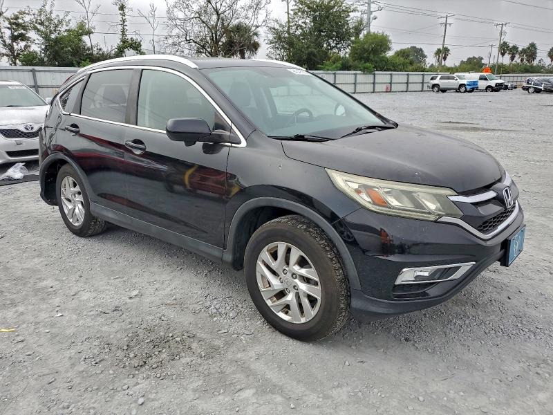 Photo 4 from auction – 2015 HONDA CR-V with VIN 5J6RM4H71FL060004