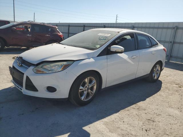 FORD FOCUS SE 2014 with VIN 1FADP3F24EL203850 - Photo from auction