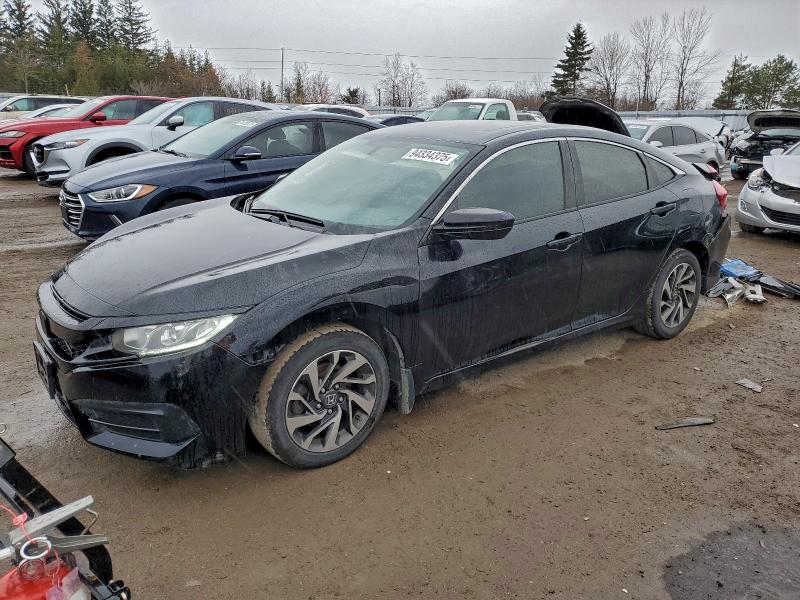 HONDA CIVIC EX 2016 with VIN 2HGFC2F70GH037560 - Photo from auction