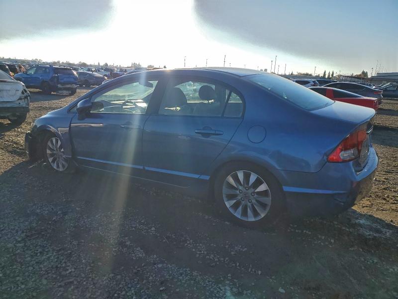 Photo 2 from auction – 2010 HONDA CIVIC with VIN 19XFA1F93AE037524