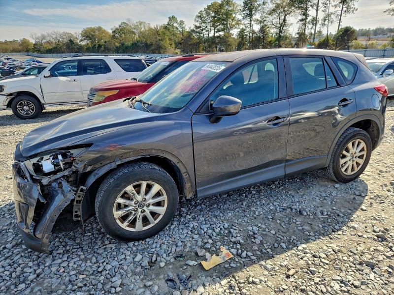 MAZDA CX-5 SPORT 2014 with VIN JM3KE2BE9E0334623 - Photo from auction