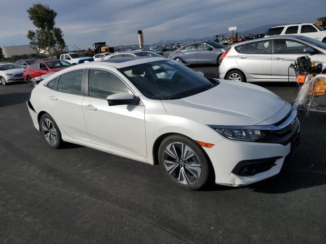 Photo 4 from auction – 2018 HONDA CIVIC EX with VIN JHMFC1F36JX004036
