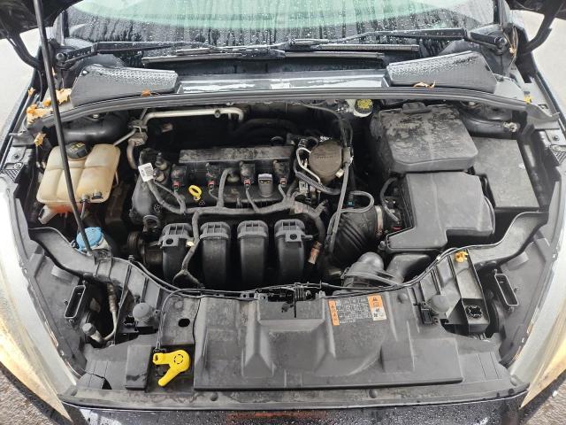 Foto 11 de la subasta – 2015 FORD FOCUS SE con VIN 1FADP3K27FL202814