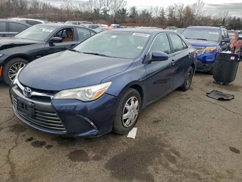 TOYOTA CAMRY LE 2016 with VIN 4T4BF1FK6GR569235 - Photo from auction