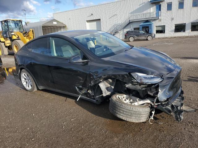 Photo 4 from auction – 2023 TESLA MODEL Y with VIN LRWYGDFDXPC227735