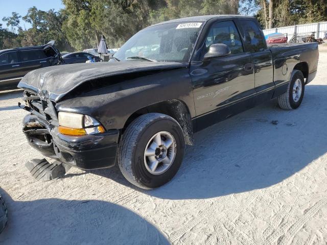 DODGE DAKOTA 2000 with VIN 1B7GL22X8YS673081 - Photo from auction