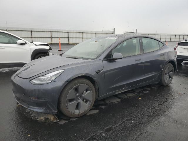 TESLA MODEL 3 2023 with VIN 5YJ3E1EA0PF706497 - Photo from auction