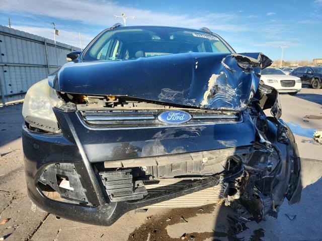 Photo 5 from auction – 2016 FORD ESCAPE TIT with VIN 1FMCU9J95GUC79351
