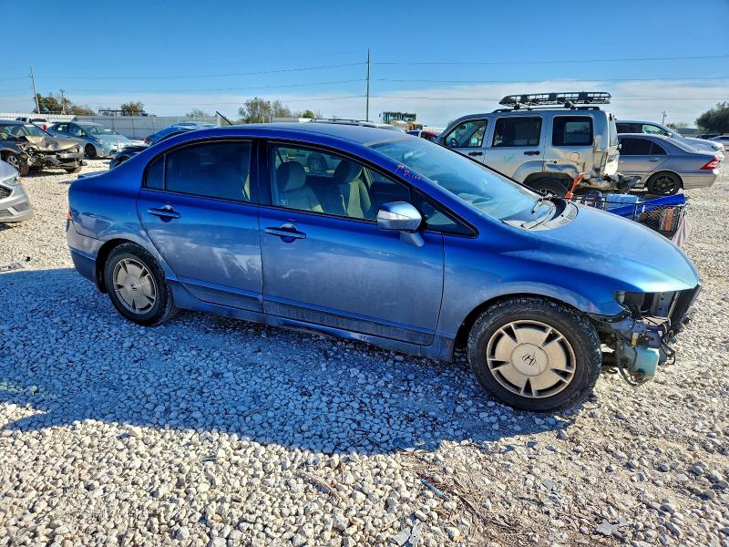 Photo 4 from auction – 2011 HONDA CIVIC HYBR with VIN JHMFA3F24BS000462