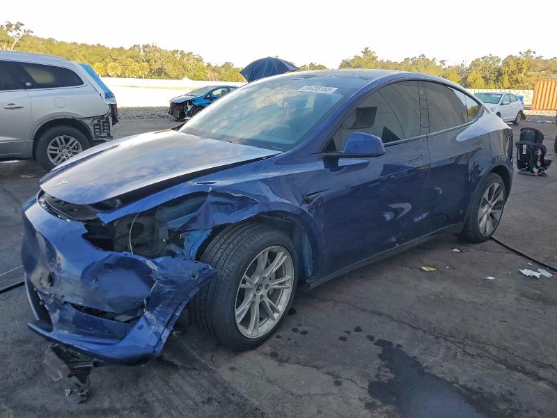 TESLA MODEL Y 2023 with VIN 7SAYGAEE7PF759476 - Photo from auction