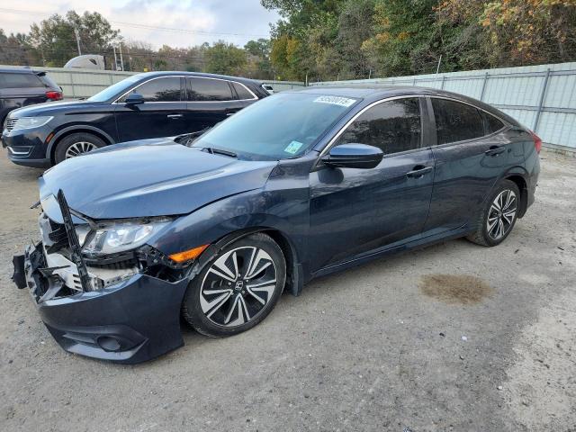 Photo 1 from auction – 2018 HONDA CIVIC EX with VIN JHMFC1F31JX003411