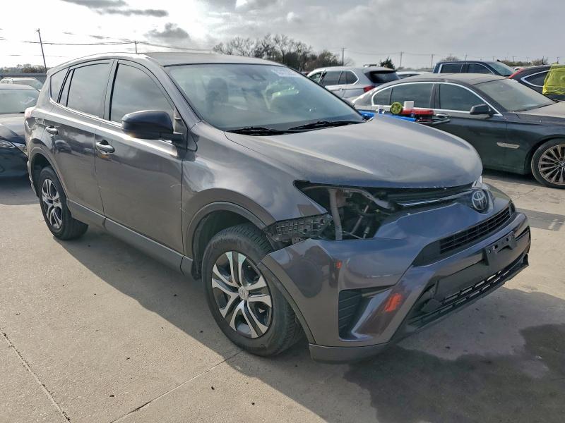 Photo 4 from auction – 2018 TOYOTA RAV4 LE with VIN JTMZFREV3JJ208397