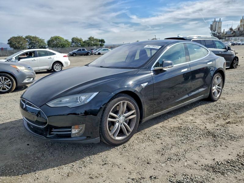 TESLA MODEL S 2014 with VIN 5YJSA1H14EFP63401 - Photo from auction