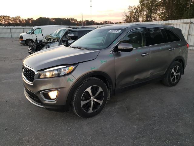 KIA SORENTO EX 2016 with VIN 5XYPH4A1XGG009766 - Photo from auction