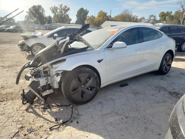TESLA MODEL 3 2018 with VIN 5YJ3E1EA2JF033171 - Photo from auction