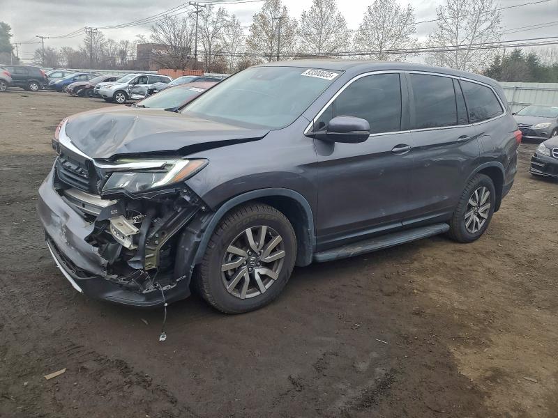 HONDA PILOT EXL 2019 with VIN 5FNYF5H50KB022213 - Photo from auction