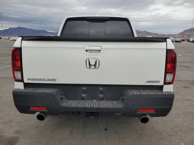 Photo 6 from auction – 2022 HONDA RIDGELINE with VIN 5FPYK3F71NB003895