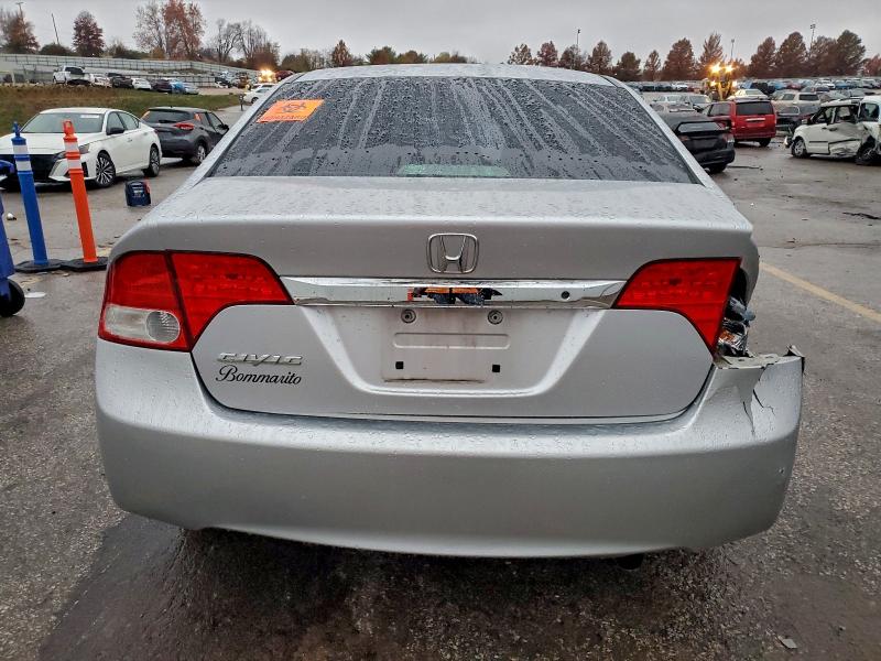 Photo 6 from auction – 2011 HONDA CIVIC with VIN 19XFA1F57BE034057