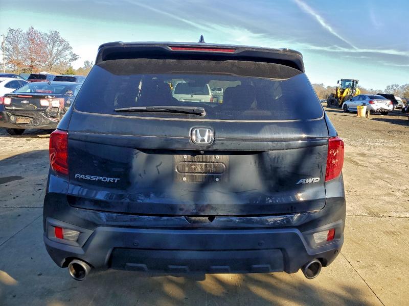Photo 6 from auction – 2024 HONDA PASSPORT E with VIN 5FNYF8H50RB020960