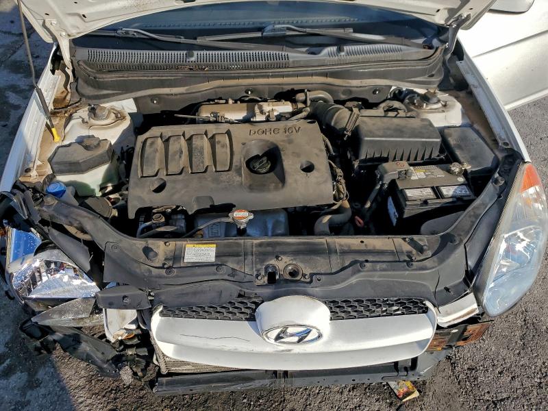 Photo 12 from auction – 2010 HYUNDAI ACCENT BLU with VIN KMHCM3AC6AU160529