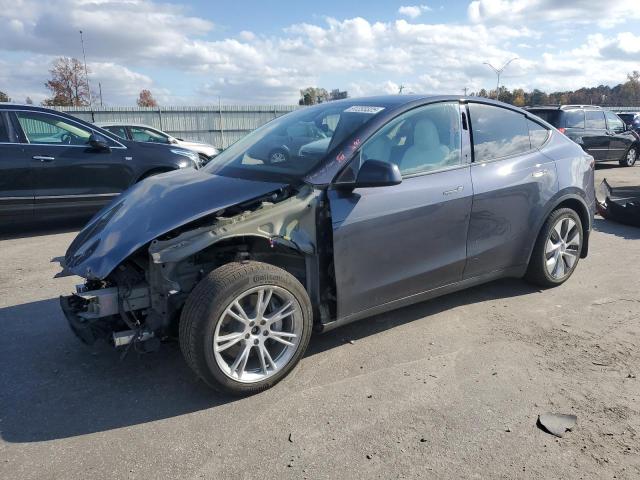 TESLA MODEL Y 2023 with VIN 7SAYGAEE0PF915096 - Photo from auction