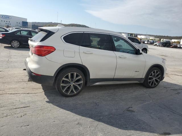 Photo 3 from auction – 2016 BMW X1 XDRIVE2 with VIN WBXHT3C32GP885646