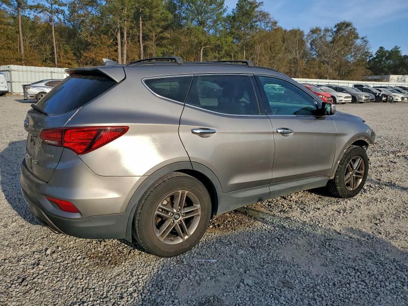 Photo 3 from auction – 2017 HYUNDAI SANTA FE S with VIN 5NMZU3LB7HH036564