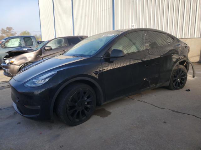 TESLA MODEL Y 2022 with VIN 7SAYGDEE9NF309231 - Photo from auction