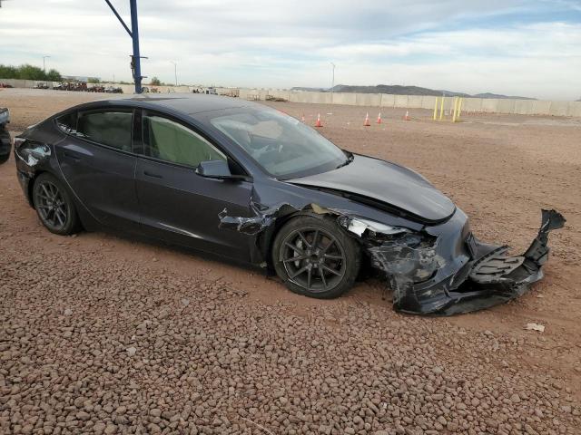 Photo 4 from auction – 2022 TESLA MODEL 3 with VIN 5YJ3E1EAXNF189996