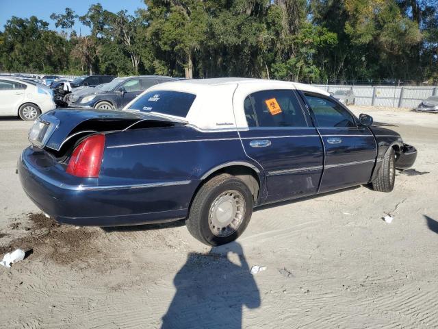 Photo 3 from auction – 2001 LINCOLN TOWN CAR E with VIN 1LNHM81WX1Y712264