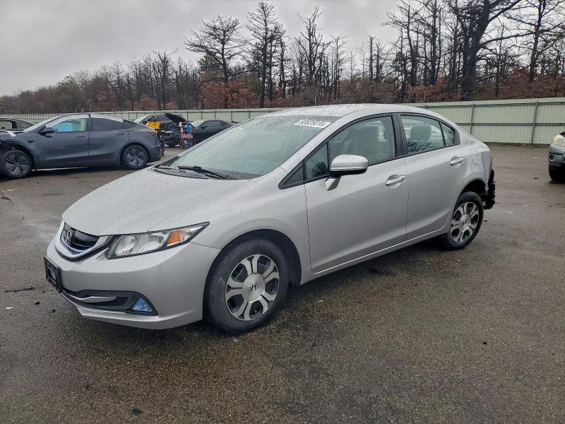 HONDA CIVIC HYBR 2015 with VIN 19XFB4F24FE201131 - Photo from auction