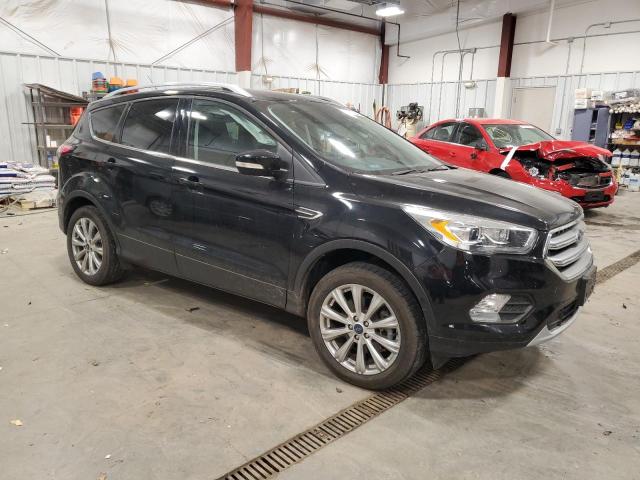 Photo 4 from auction – 2017 FORD ESCAPE TIT with VIN 1FMCU9J98HUE33715