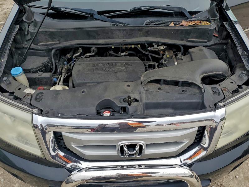 Photo 12 from auction – 2011 HONDA PILOT TOUR with VIN 5FNYF4H96BB006806
