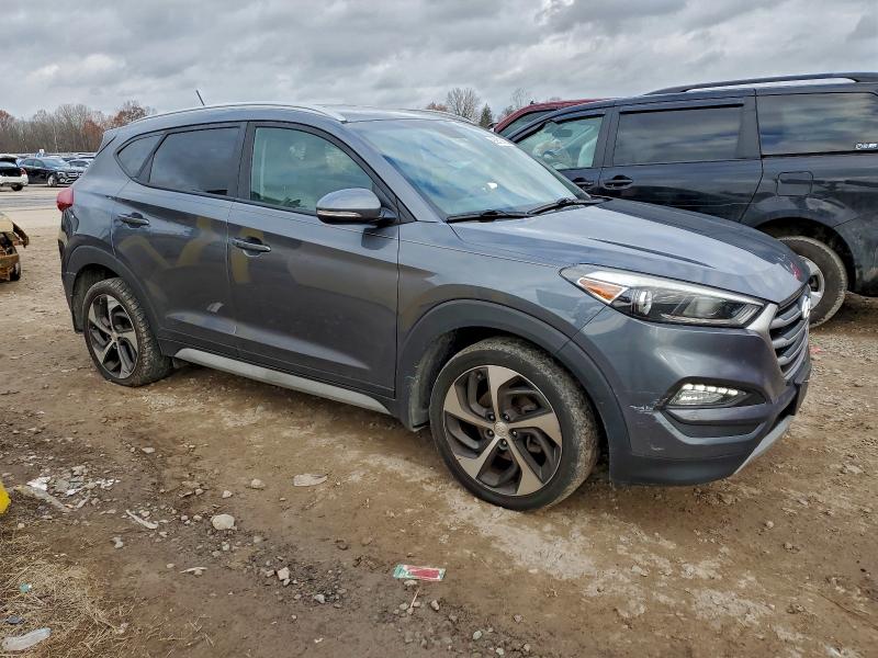 Photo 4 from auction – 2017 HYUNDAI TUCSON LIM with VIN KM8J3CA21HU404552