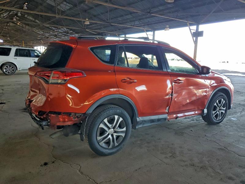 Photo 3 from auction – 2016 TOYOTA RAV4 LE with VIN JTMZFREV6GJ089527