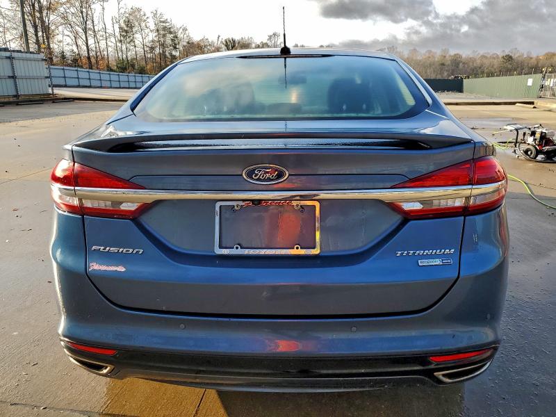 Photo 6 from auction – 2018 FORD FUSION TIT with VIN 3FA6P0D96JR193941