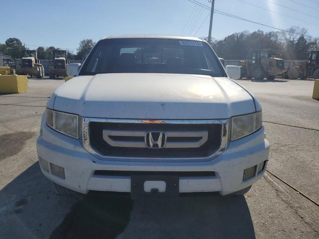 Photo 5 from auction – 2011 HONDA RIDGELINE with VIN 5FPYK1F56BB003468
