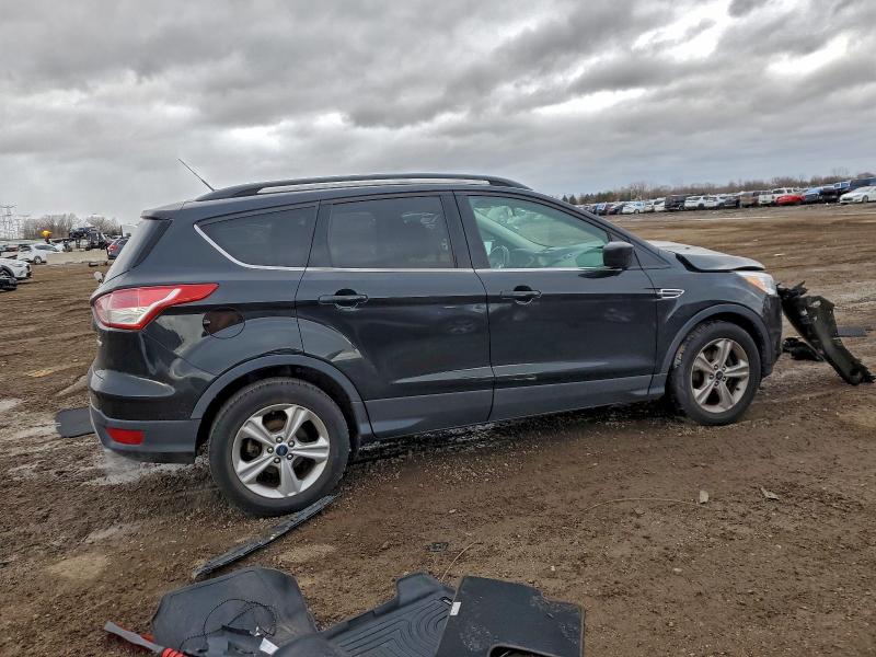 Photo 3 from auction – 2015 FORD ESCAPE SE with VIN 1FMCU0GX7FUA63274