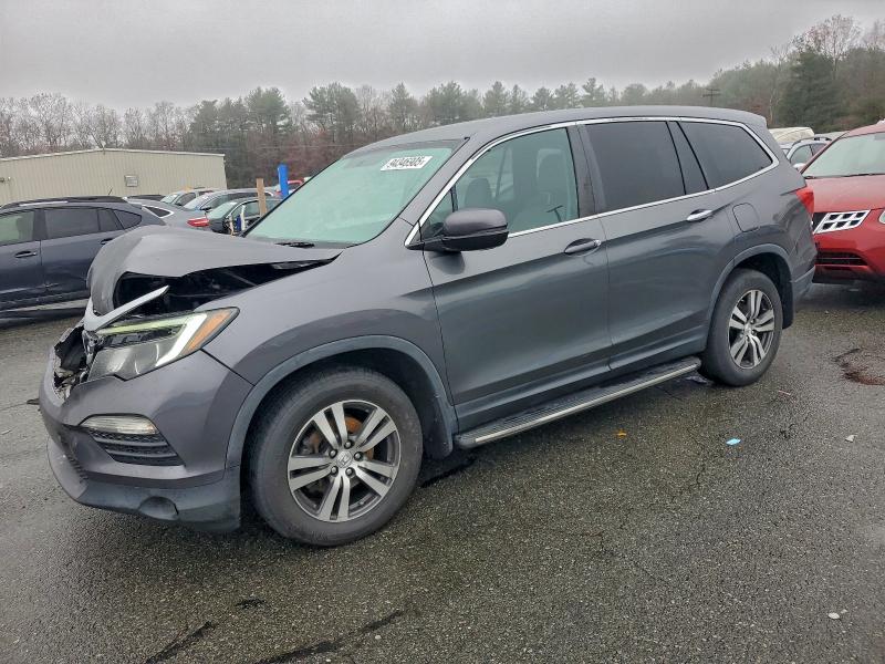 HONDA PILOT EXL 2016 with VIN 5FNYF6H55GB009177 - Photo from auction