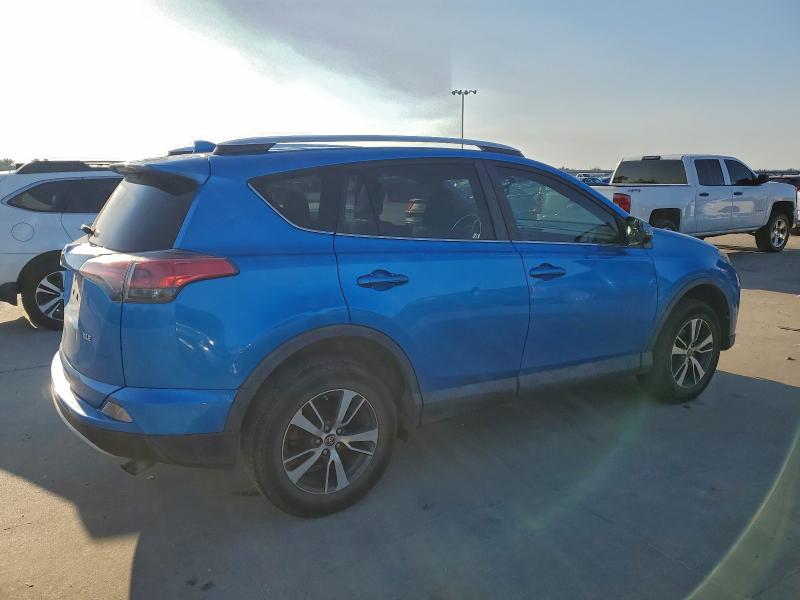 Photo 3 from auction – 2016 TOYOTA RAV4 XLE with VIN 2T3WFREV5GW300088