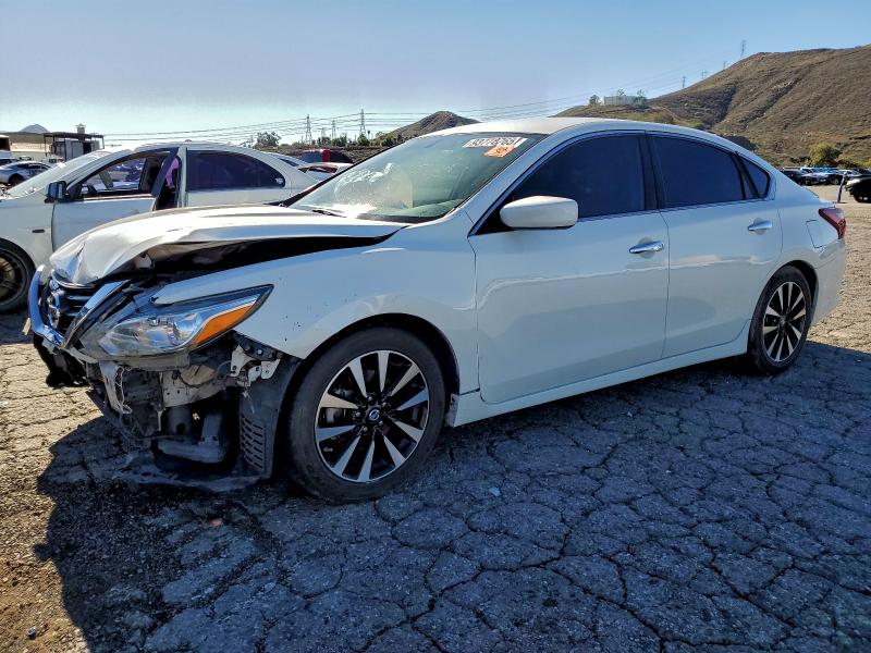NISSAN ALTIMA 2.5 2018 with VIN 1N4AL3AP3JC182873 - Photo from auction