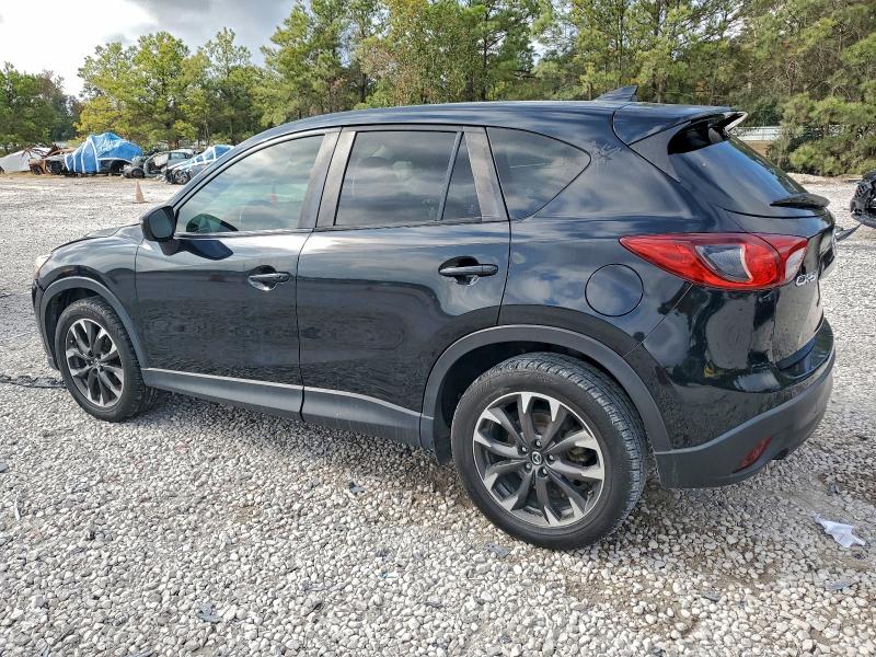 Photo 2 from auction – 2016 MAZDA CX-5 GT with VIN JM3KE2DY4G0910242