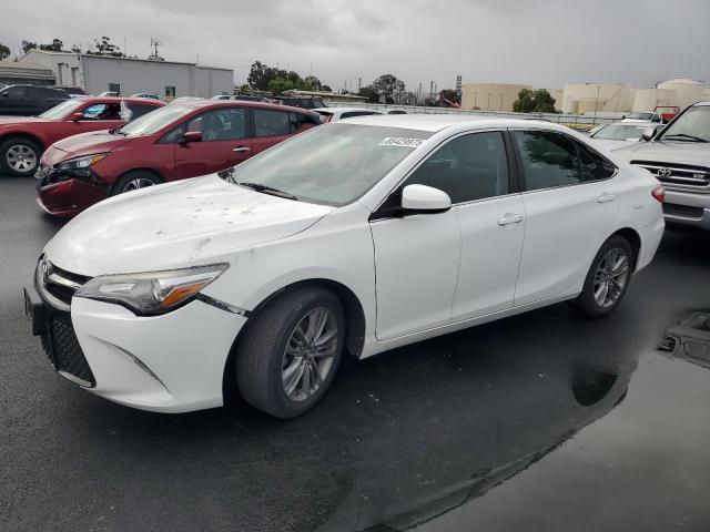 TOYOTA CAMRY LE 2017 with VIN 4T1BF1FK9HU806327 - Photo from auction