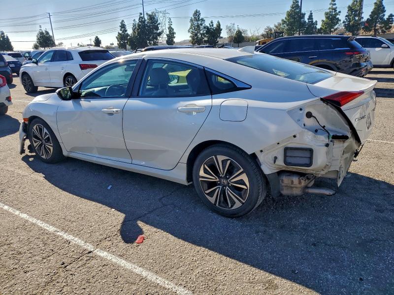Photo 2 from auction – 2016 HONDA CIVIC EX with VIN 2HGFC1F39GH640577