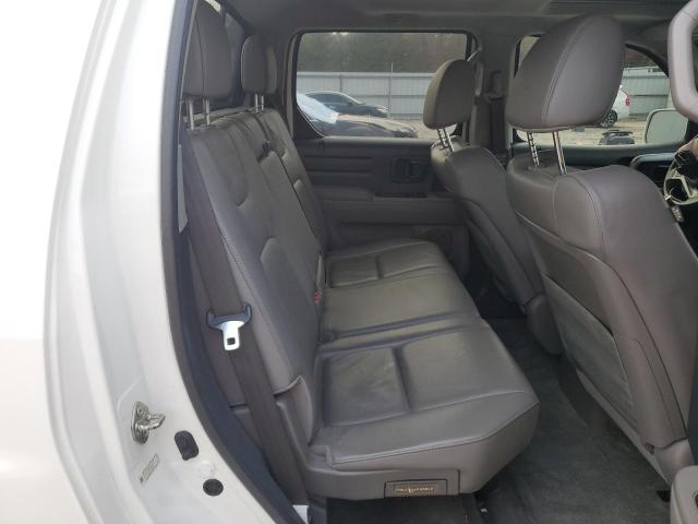 Photo 11 from auction – 2013 HONDA RIDGELINE with VIN 5FPYK1F54DB003777