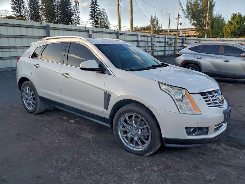 Photo 4 from auction – 2014 CADILLAC SRX PERFOR with VIN 3GYFNCE30ES643443