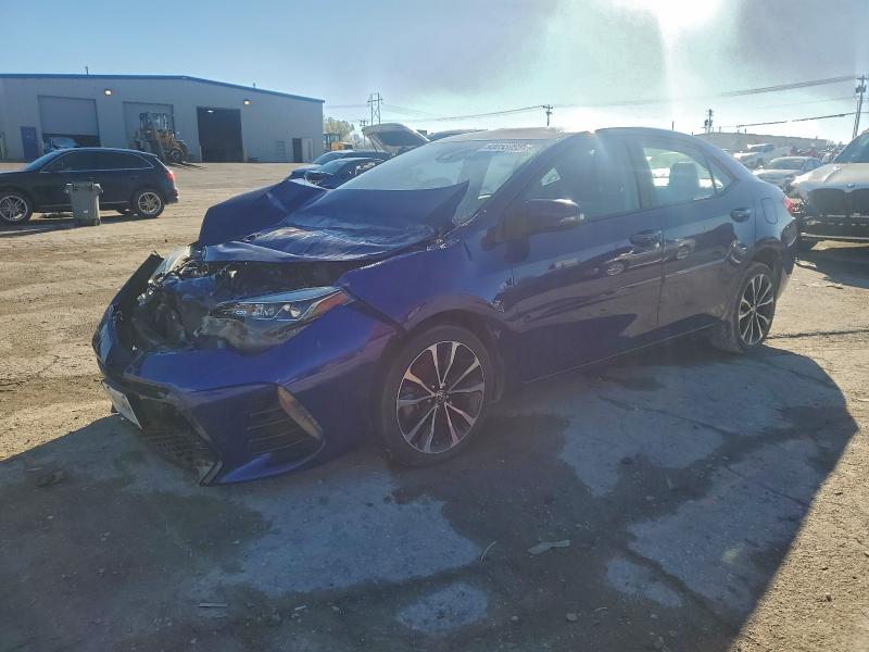 TOYOTA COROLLA L 2017 with VIN 5YFBURHE7HP645182 - Photo from auction