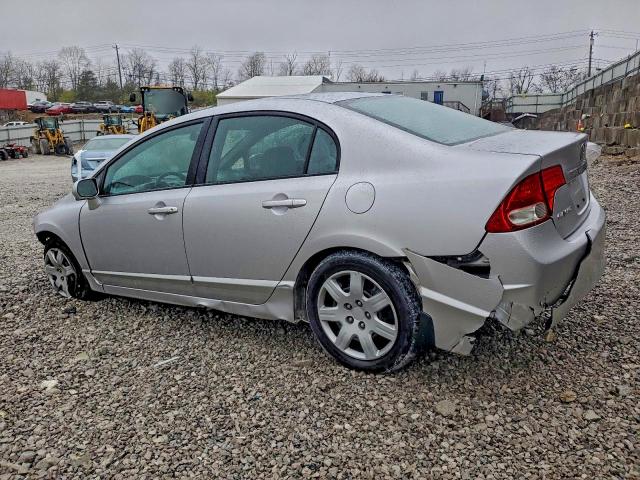 Photo 2 from auction – 2010 HONDA CIVIC LX with VIN 19XFA1F58AE084836